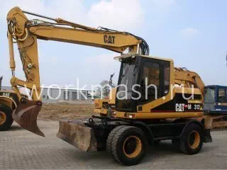 Услуги колесного экскаватора Caterpillar M312
