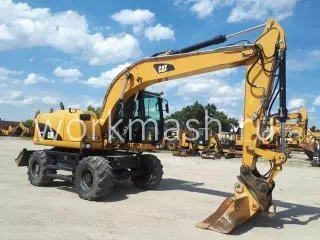 Колесный экскаватор Caterpillar M313D с оператором