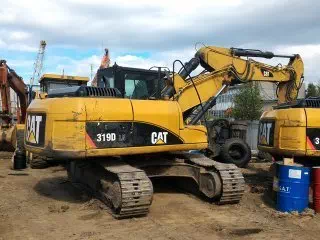 Гусеничный экскаватор Caterpillar 319DLN CL